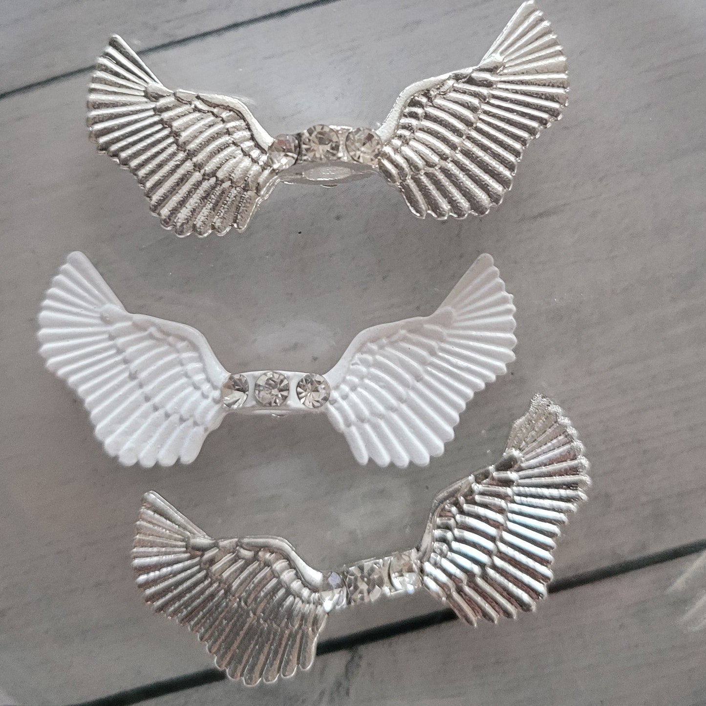 Spacer beads- white & silver metal angel wings