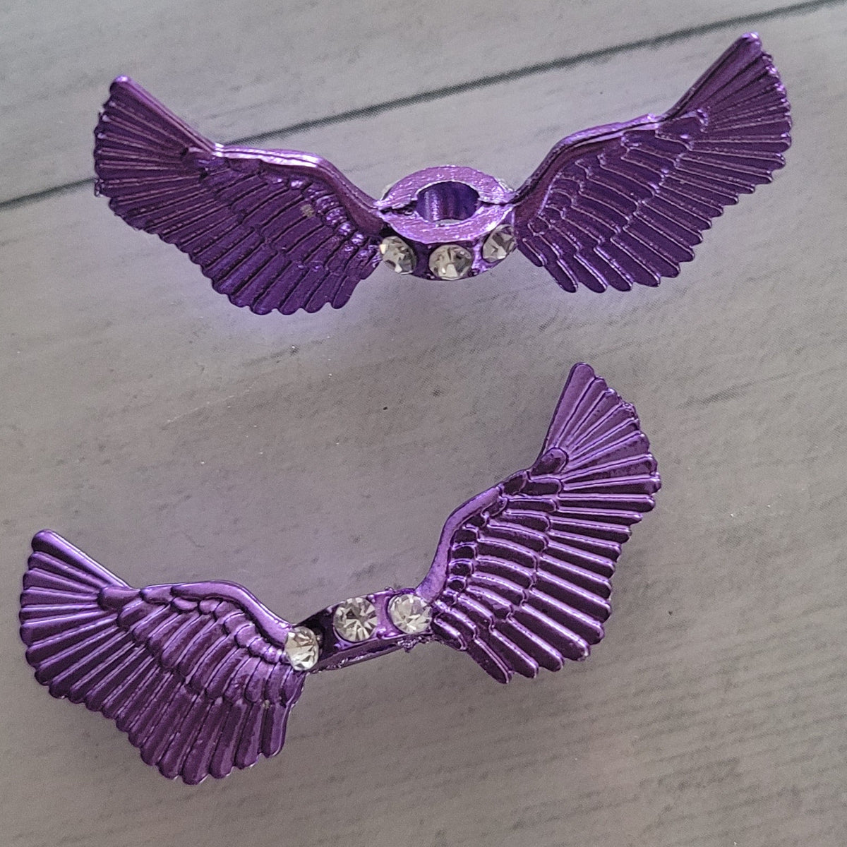 Spacer beads- purple metal angel wings