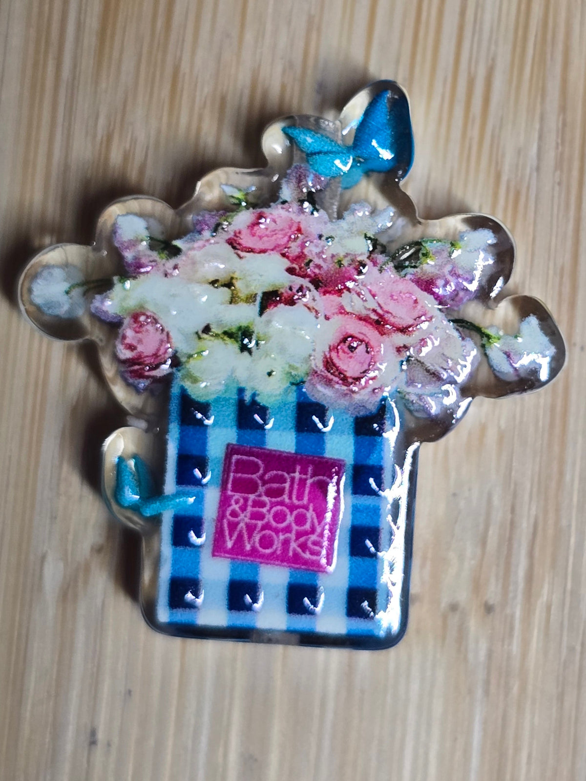 Acrylic focal beads- flowers in a checkered bag