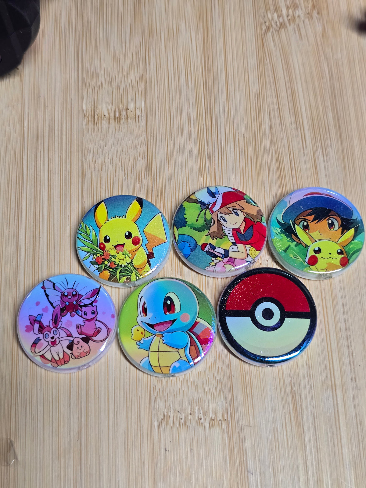 Acrylic flat round beads- pokemon mix