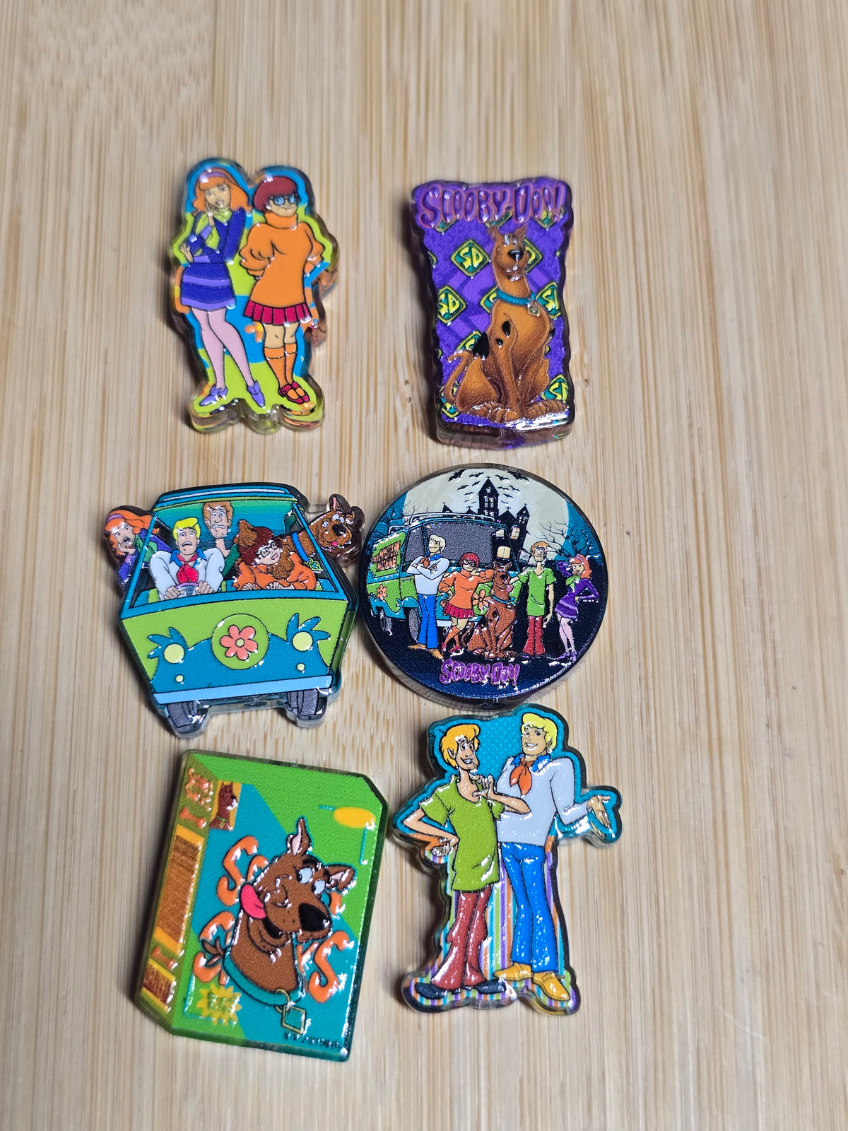 Acrylic focal beads kid detectives with a brown dog