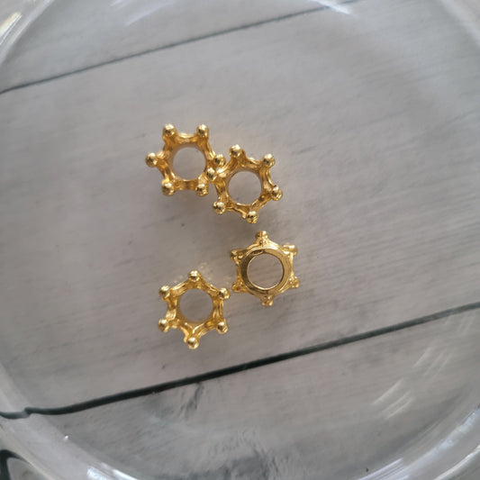 Small gold crowns