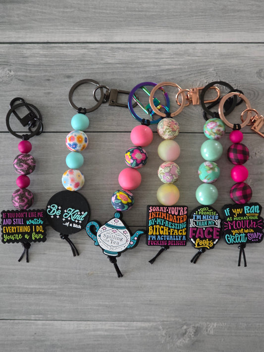Key and bag charms