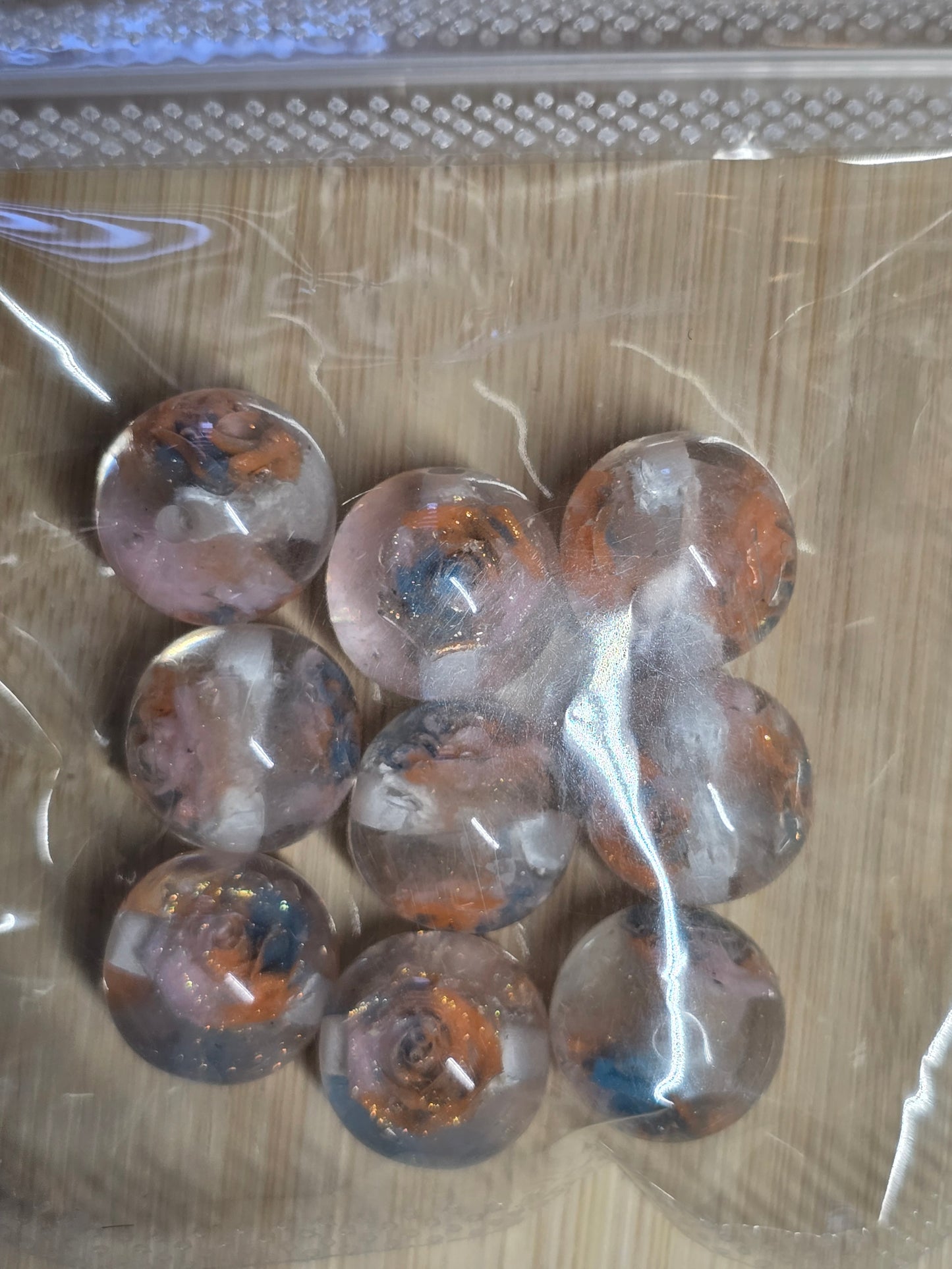 Small packs of acrylic beads