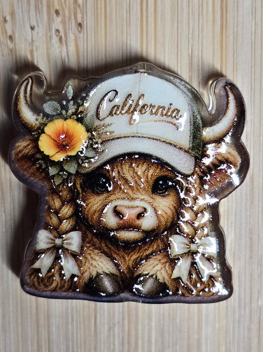 Acrylic focal beads- cutie cow with braids and a California baseball hat