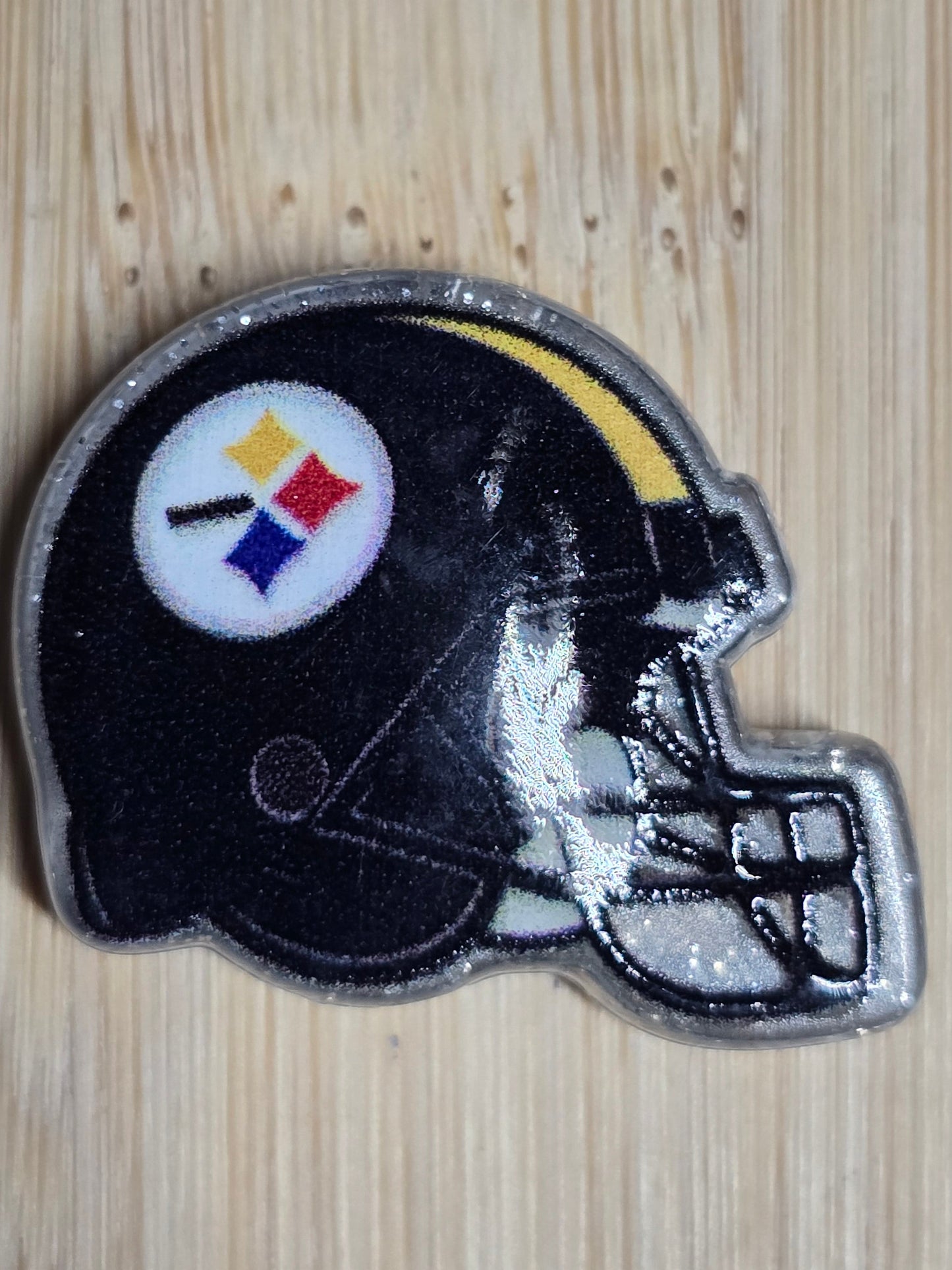 Acrylic focal beats football helmets