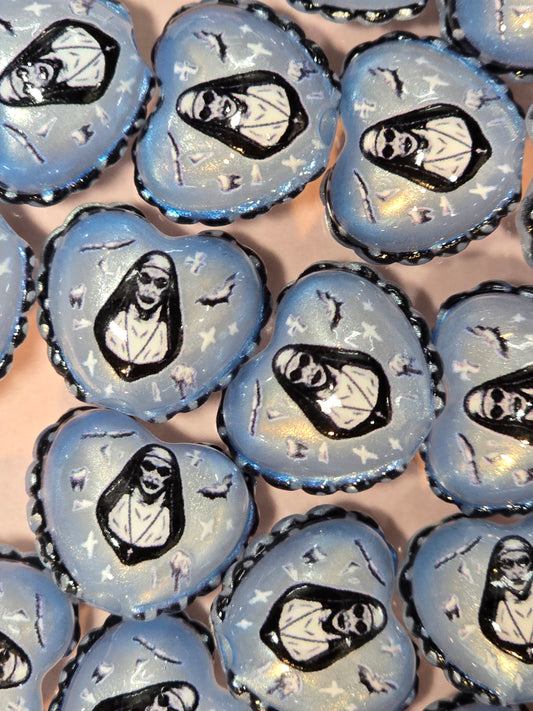 Acrylic scary nun heart beads