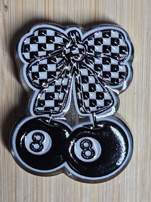 Acrylic focal beads-blk/whi checkered bow with blk 8ball