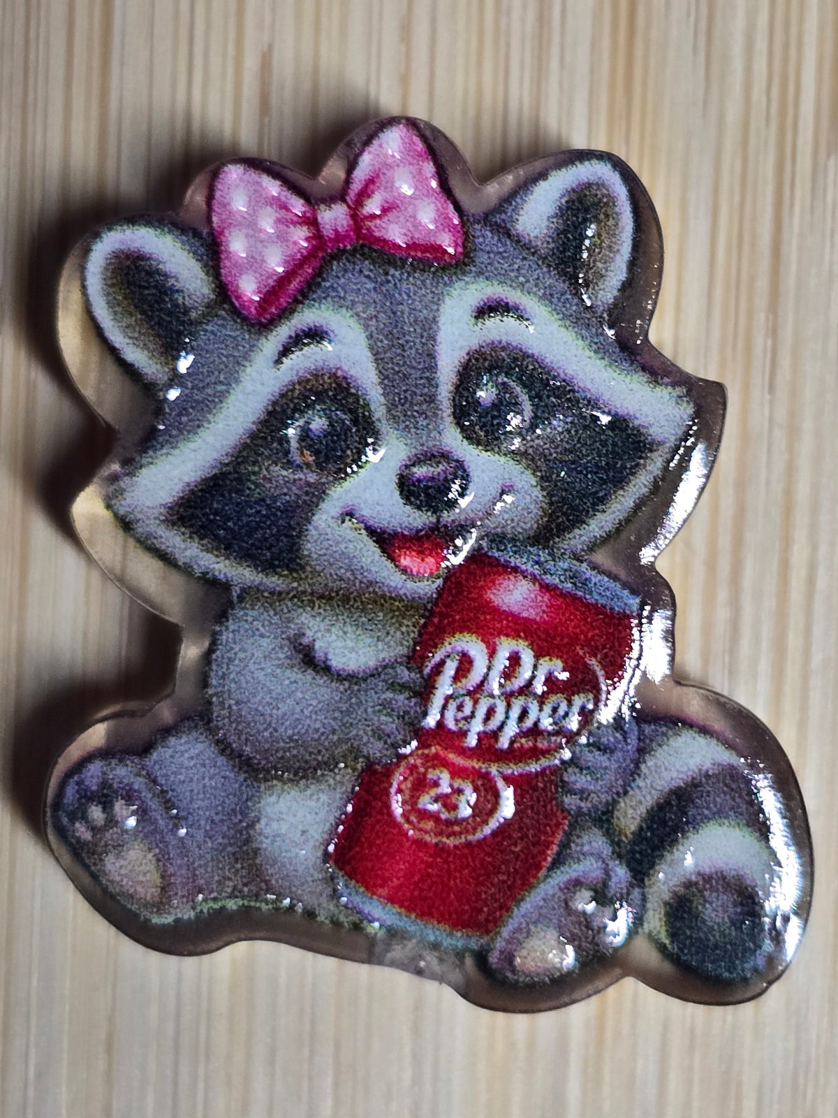 Acrylic focal beads raccoon with pink bow