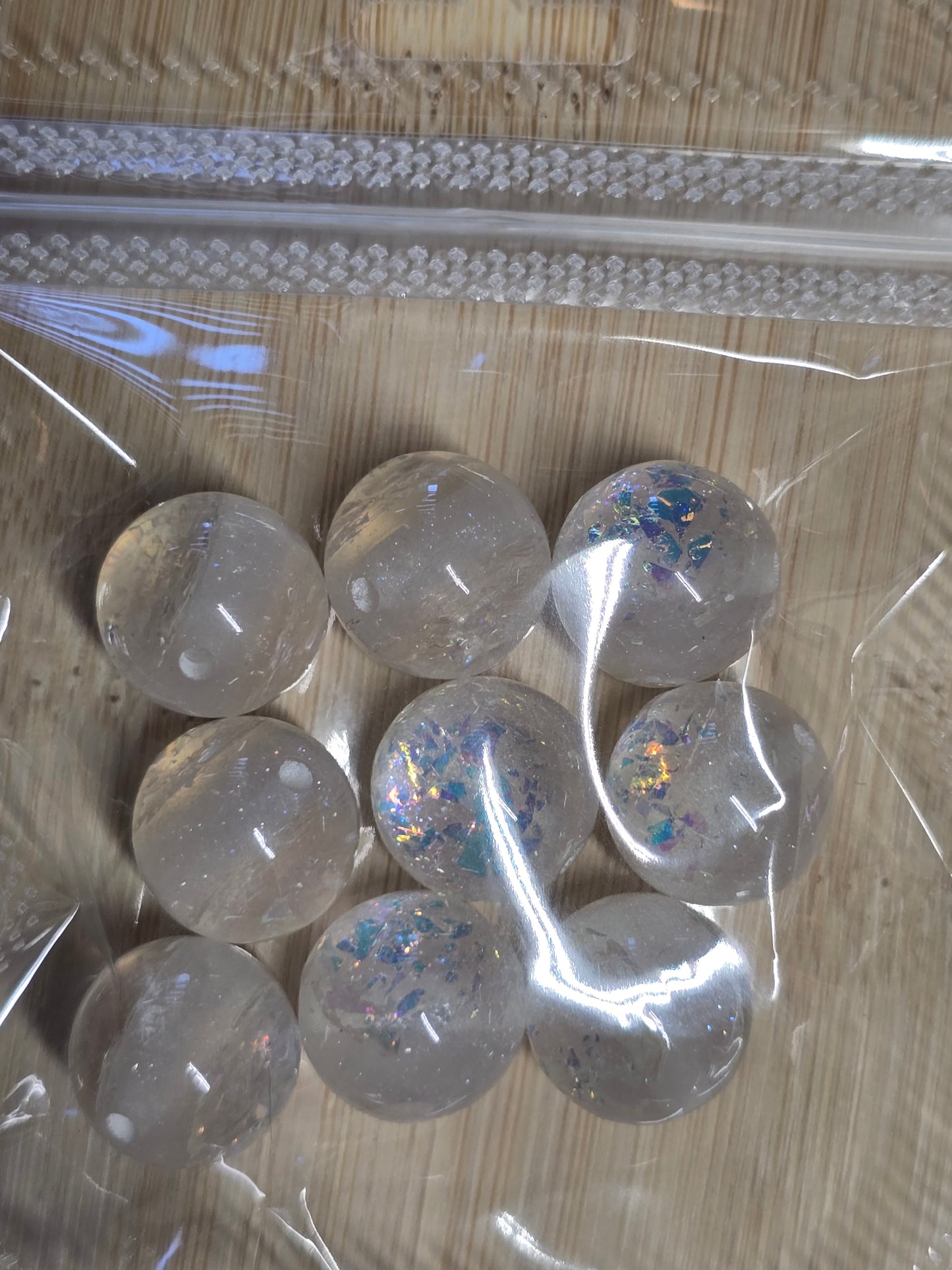 Small packs of acrylic beads