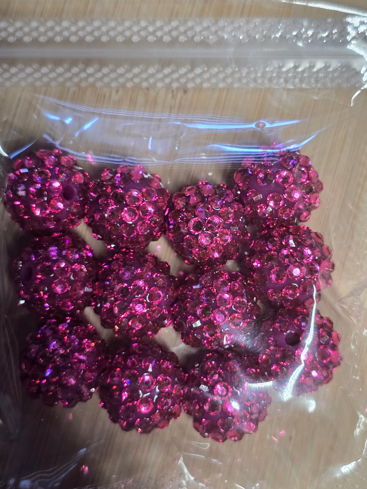 Small packs of acrylic beads