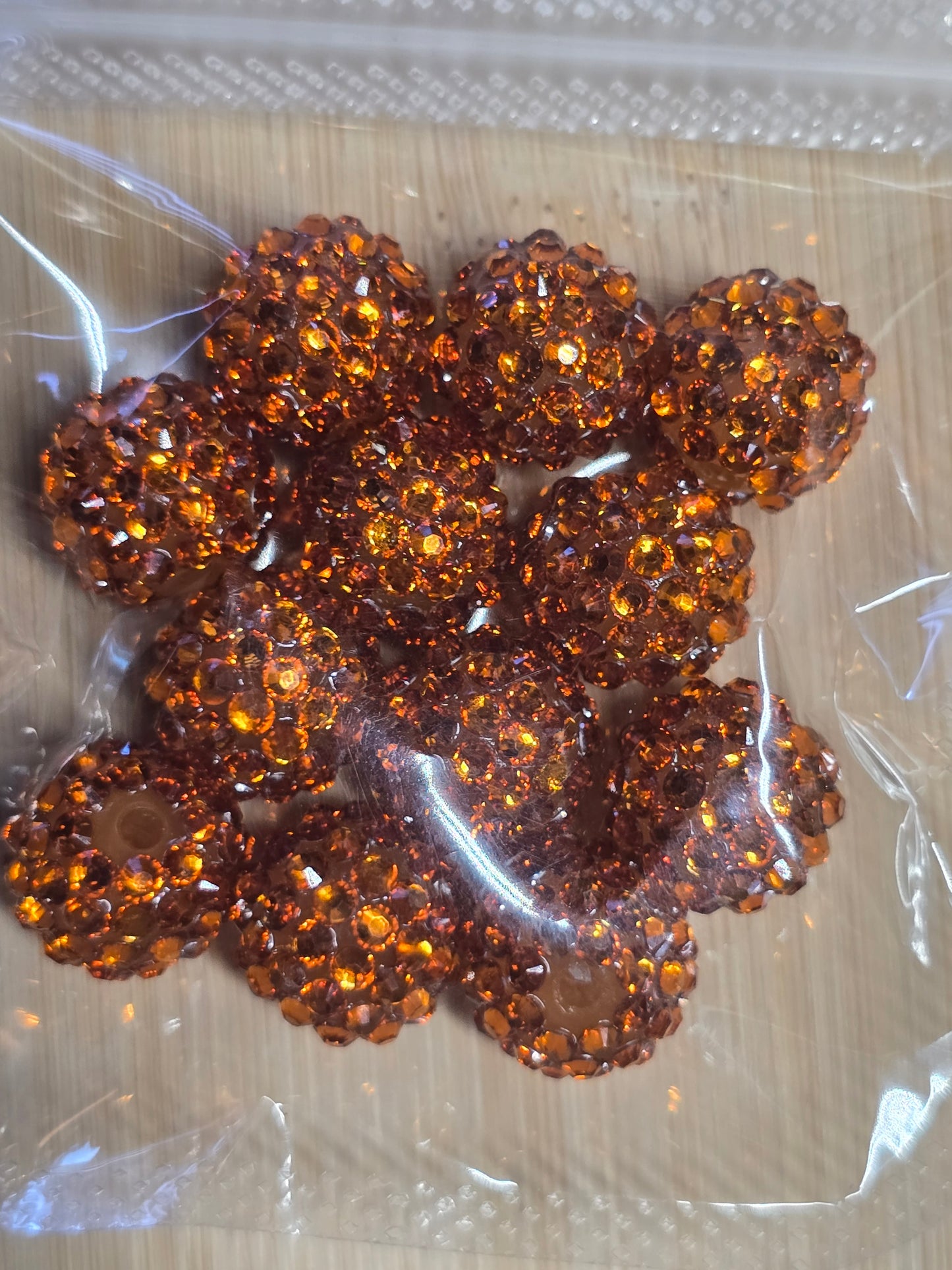 Small packs of acrylic beads