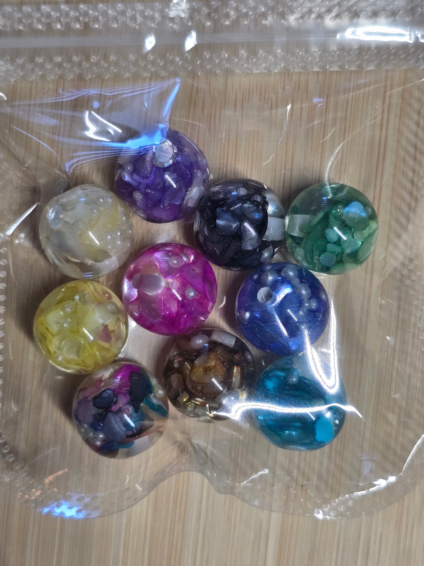 Small packs of acrylic beads