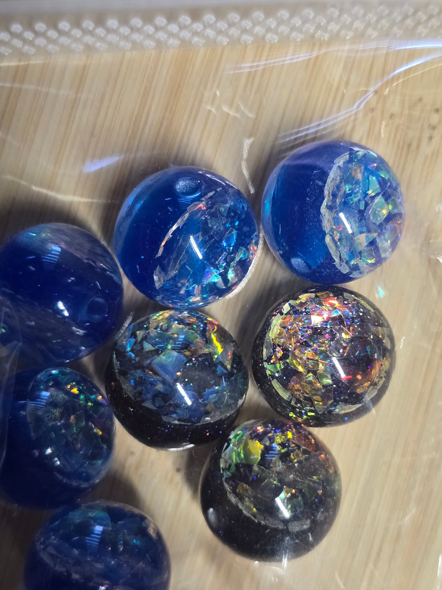 Small packs of acrylic beads