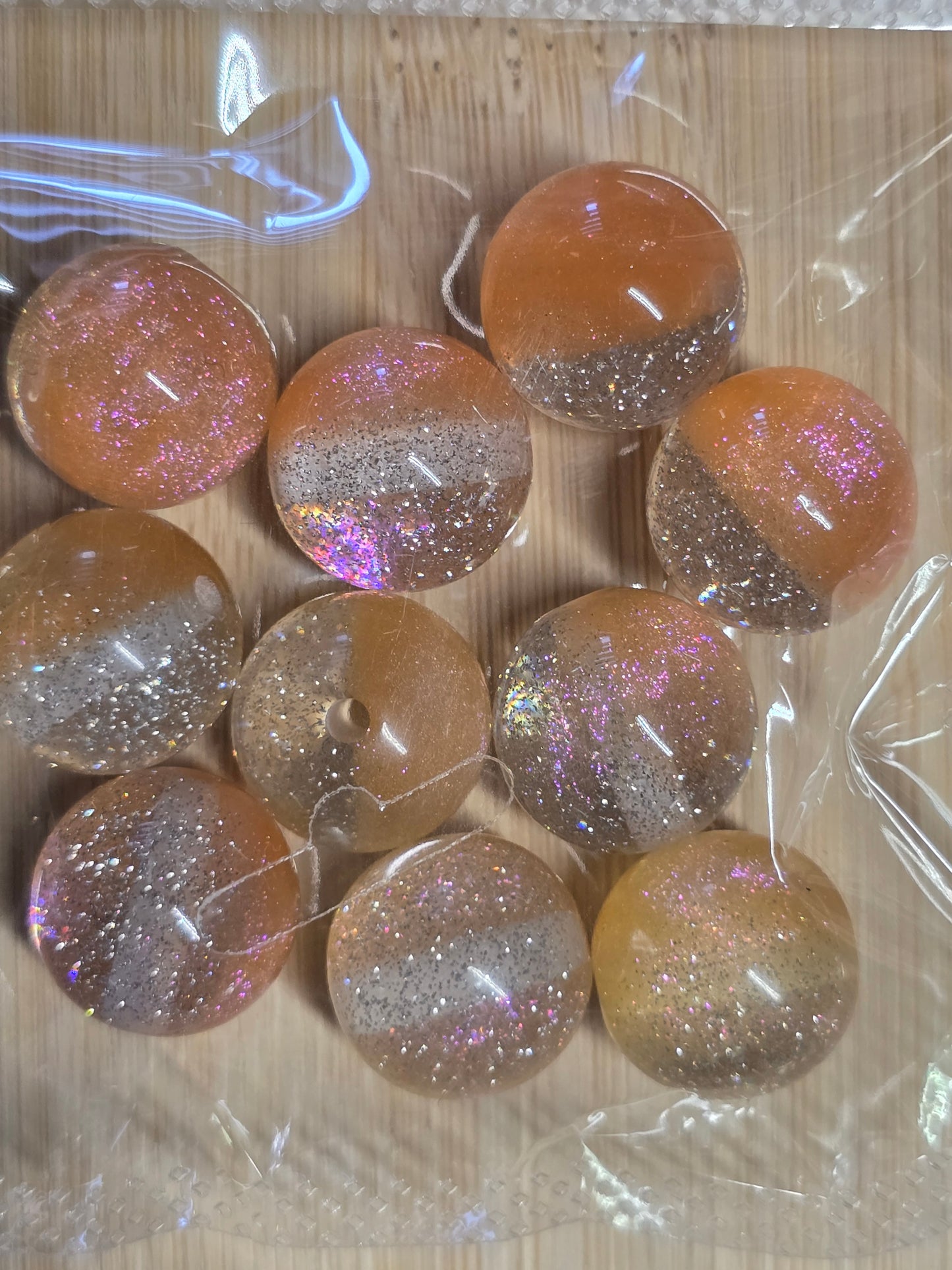 Small packs of acrylic beads